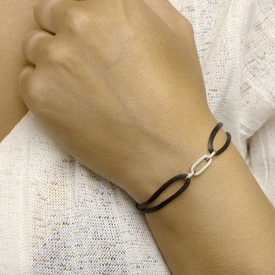 Basis | Zwart gevlochten armband uitgevoerd met een 925 zilveren element