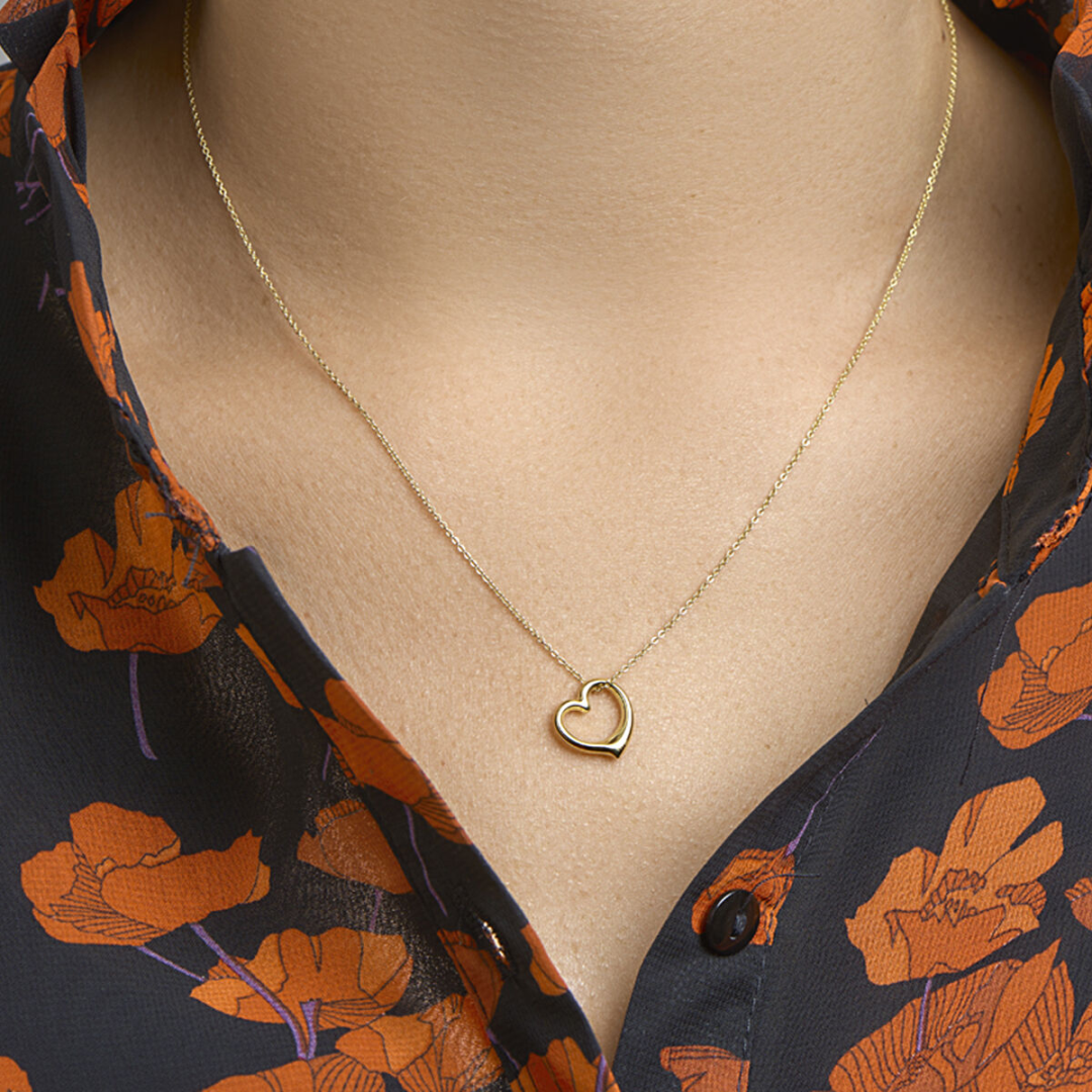 Basis | Geelgouden bedel met een hart