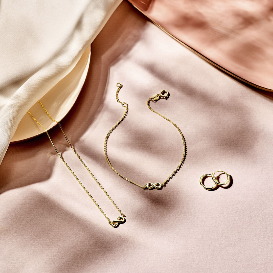 Basis | Geelgouden oorringen met een ronde buis