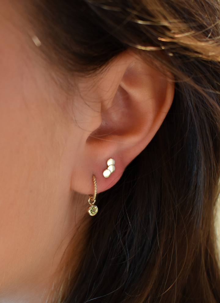 Jackie Gold | 14 karaat geelgouden oorstekers met 3 schijfjes aan elkaar | Triple Disc Studs