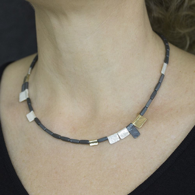 Jeh Jewels | Zilver collier met hematiet aangevuld met zilveren schakels. Deels geoxideerd en deels verguld