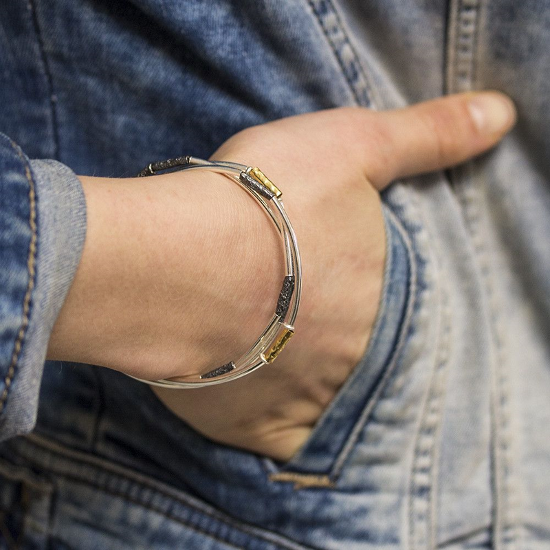 Jeh Jewels | Zilveren armband afgewisseld met geoxideerde en goldfilled buisjes. De armband heeft een 3-in-1 band