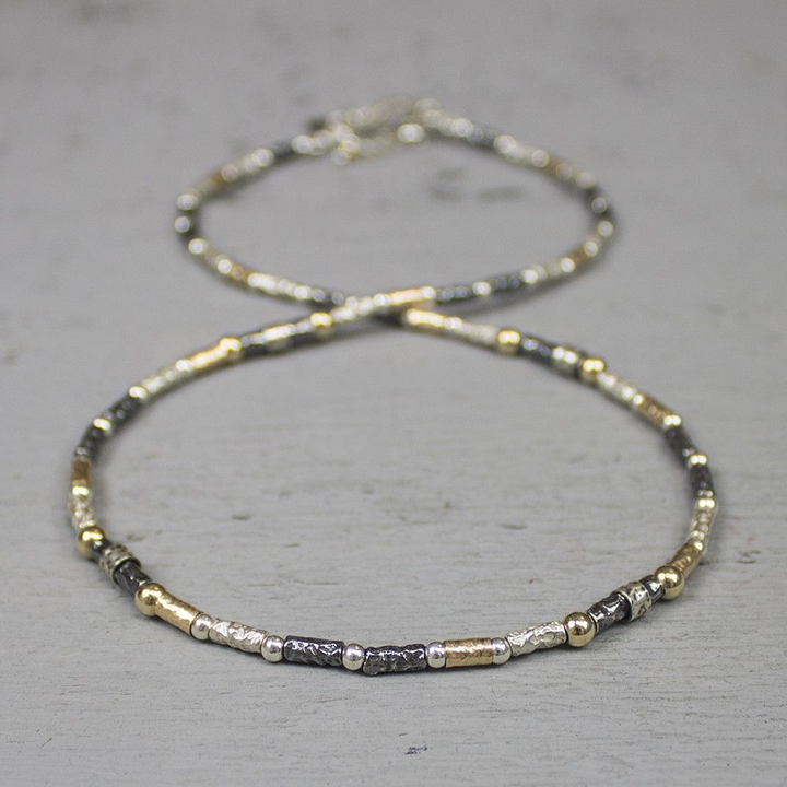 Jeh Jewels | Zilveren collier met daaraan buisjes en balletjes deel geoxideerd en deel goldfilled