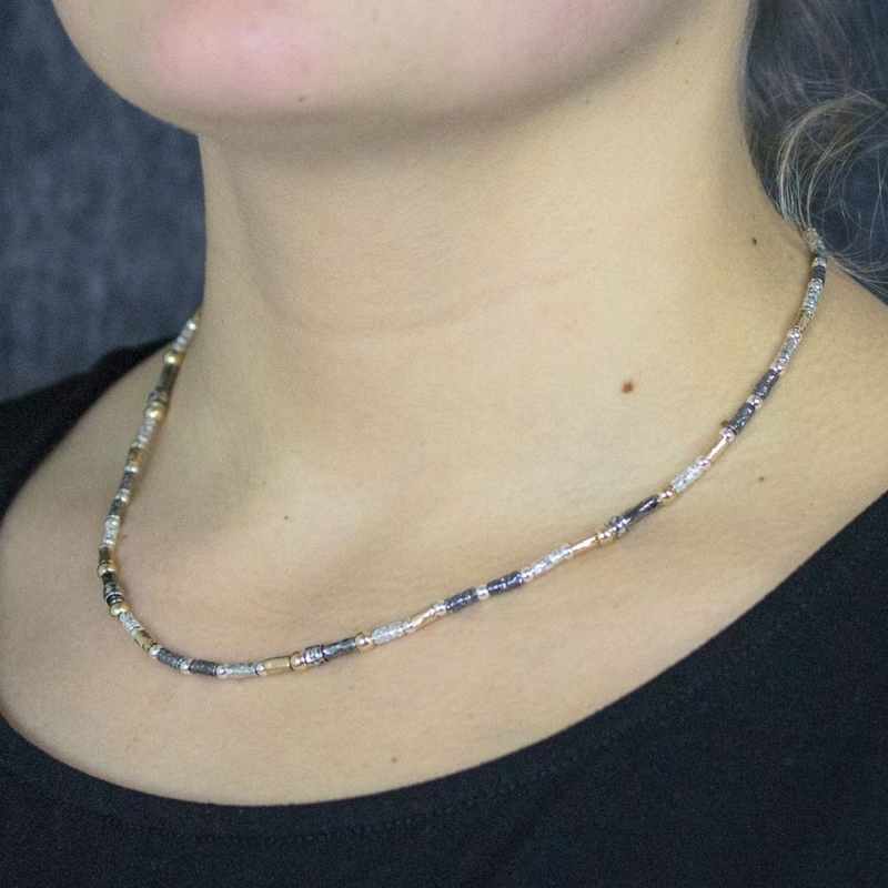 Jeh Jewels | Zilveren collier met daaraan buisjes en balletjes deel geoxideerd en deel goldfilled