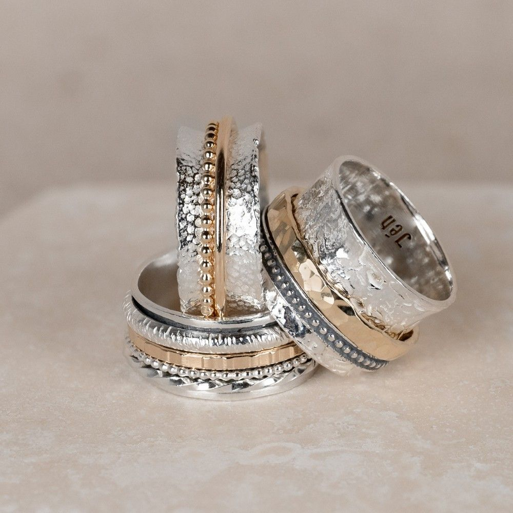 Jeh Jewels | Zilveren ring deels goldfilled en deels geoxideerd. Ringen aan de binnenkant bewegen speels