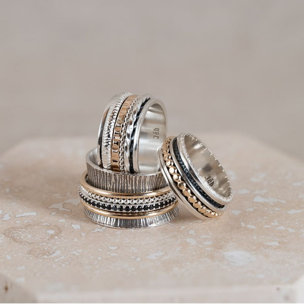 Jeh Jewels | Zilveren ring met los draaiende ringen. Deels geoxideerd en deels goldfilled