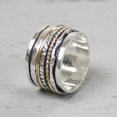 Jeh Jewels | Zilveren ring met losse bewegende ringen er omheen. Deels goldfilled en deels geoxideerd