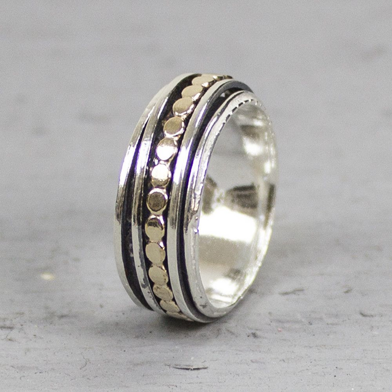 Jeh Jewels | Zilveren ring met losse bewegende ringen eromheen, waarvan één met platte goldfilled balletjes